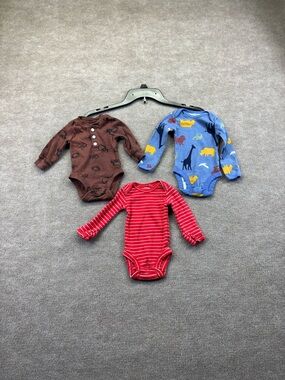 Bundle of Carters New Born Long Sleeve bodysuits. Two have the mittens size NB